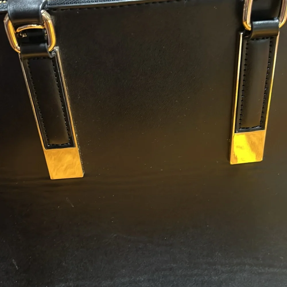 Aldo Faux leather handbag. Shoulder strap missing. Good condition. Black.